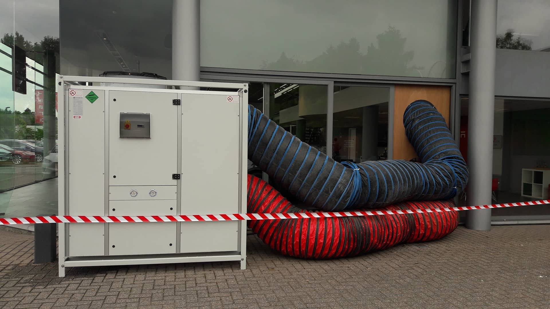 tesla Andrews Sykes koelt autoshowroom in Gent